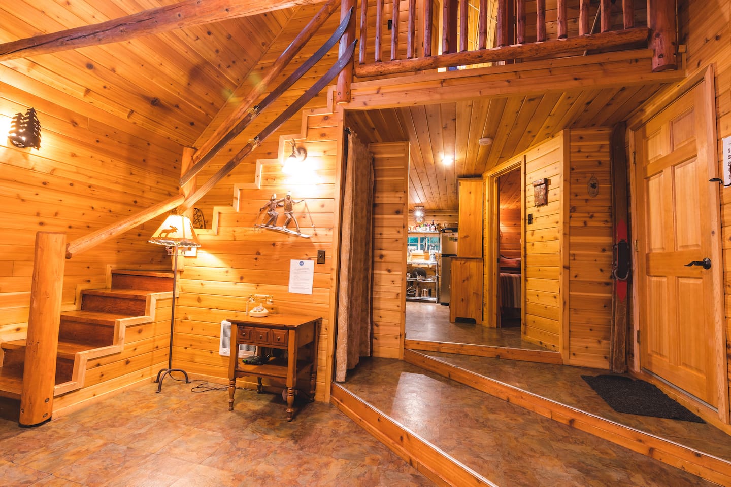 Timber staircase and hallway beside the main room