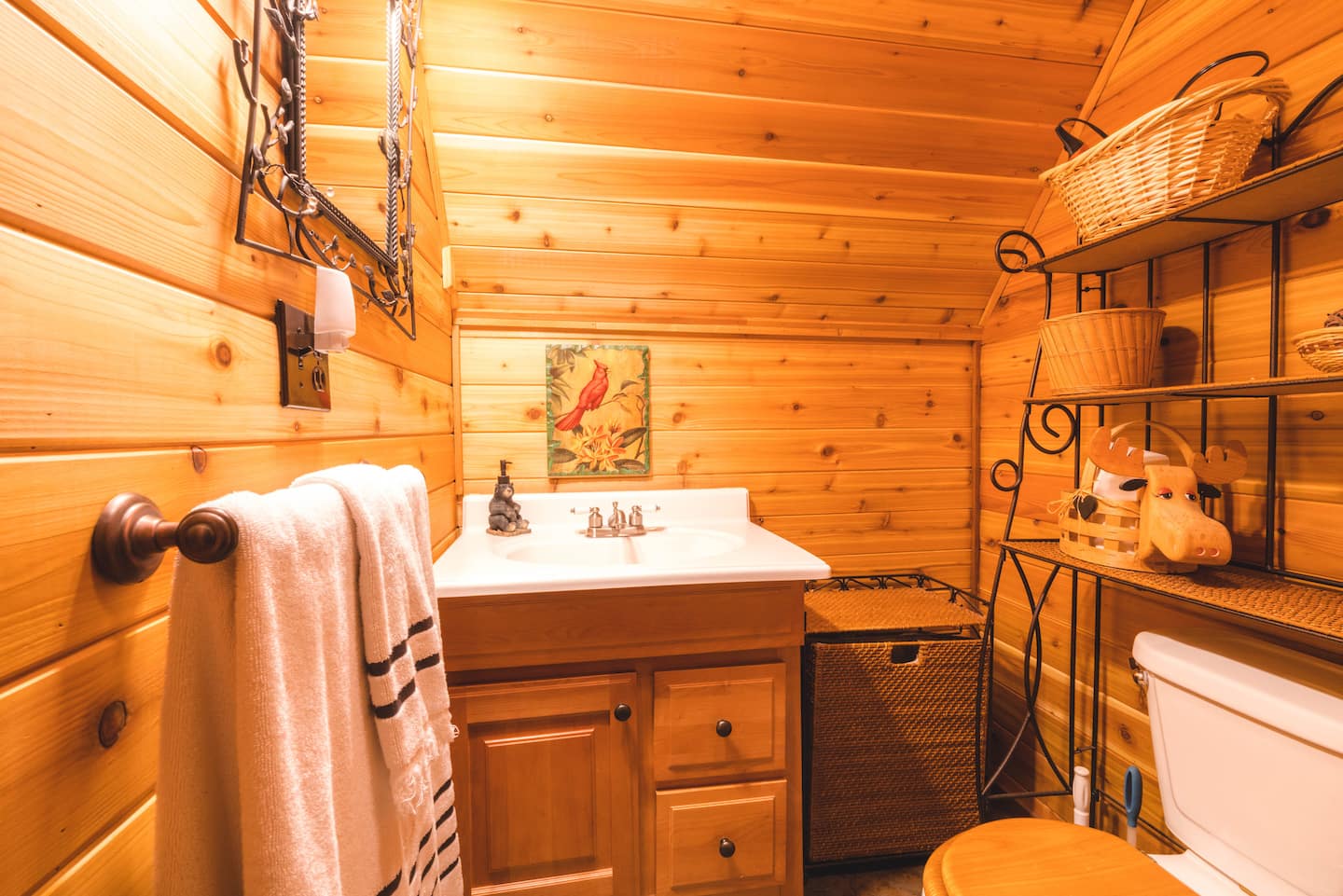 Upstairs half bathroom showing vanity and toilet